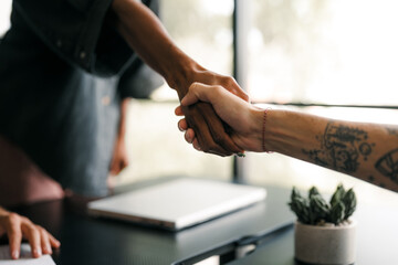 Happy office staff, success employee giving hand for shaking. Business people offering handshake