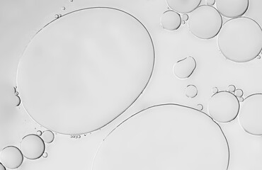 Abstract dynamic liquid art on an oil droplets pattern with beige grey silver light effaced, cozy art theme wallpaper background.