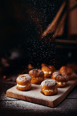 Delicious pastries dusted with powdered sugar on a wooden board in a cozy kitchen setting