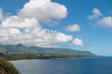 View of the north coast of the island of Kauai from Kilauea Point to Princeville and Hanalei. A sweeping panorama that includes the rugged, green cliffs of the Nāpali Coast in the distance.