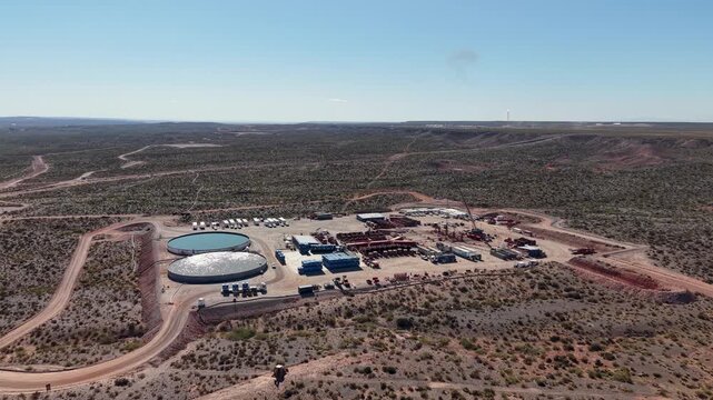 Vaca Muerta, Argentina, October 18, 2025: Aerial view of unconventional oil and gas extraction (shale oil) in A&ntilde;elo, Neuqu&eacute;n. Fracking equipment.