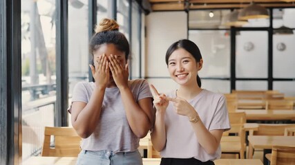 Two Friends Sharing a Moment of Embarrassment