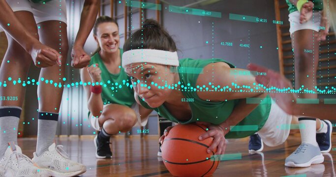 Woman performing push-up on basketball in gym in green jersey white shorts, with metrics overlay