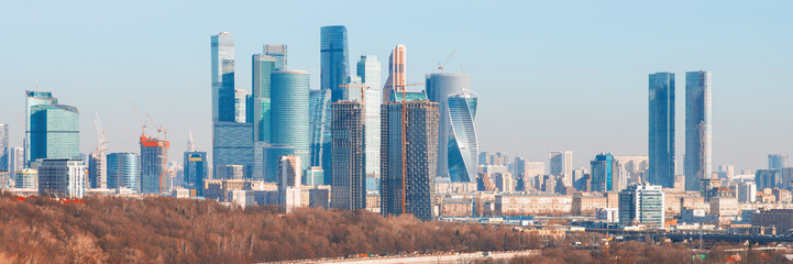 Panorama of a large modern city with skyscrapers. View of city blocks with high-rise buildings. Beautiful cityscape. Moscow, Russia.