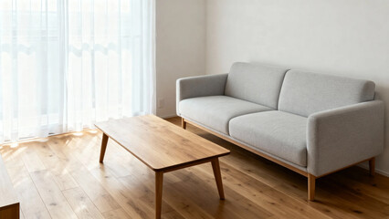 Fototapeta premium Minimalist living room with gray sofa and wooden coffee table on hardwood floor