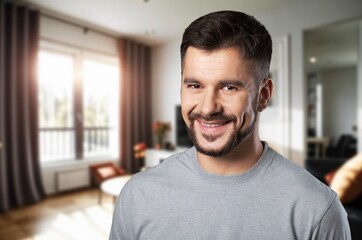Obraz premium Happy confident man standing at home.