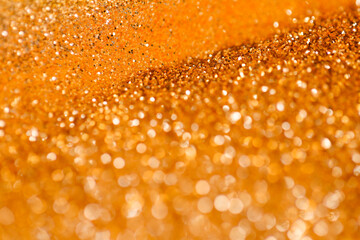  shining glitter.Abstract Background of Golden Glitter with Bokeh. Glow background with highlights,...