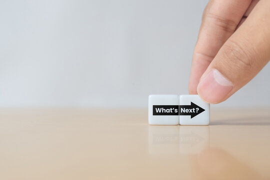 What's next?, business concept. Next step of work, plan, strategies, vision, project implementation, new opportunities and execution. Putting dice with What's next? and forward arrow symbols