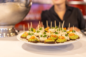 Delicious hors d'oeuvres served at a gathering in a modern setting