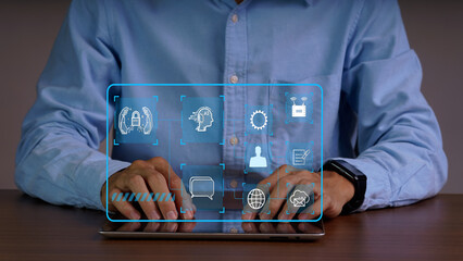 A businessman using a digital tablet with virtual interface icons representing data protection, artificial intelligence, and technology innovation.