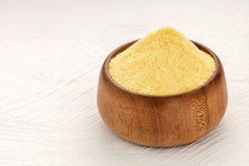 Wheat semolina in a wooden bowl - Triticum