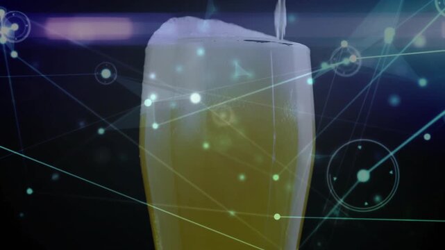 Silvery stream pouring into tall beer glass forming foam with network drifting showcasing foam