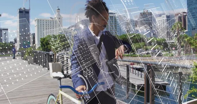 Businessman pushing bike on boardwalk and tapping watch inspecting holographic finance metrics