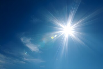 Obraz premium Close Up of Bright Sun with Lens Flare Effect Against Blue Sky Creating Natural Light Photography