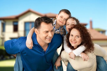 Parents with children outdoor playful interaction