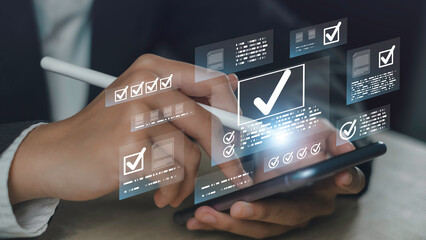 Quality control and approval concept with business hand using digital checklist on smartphone. Symbolizes validation, compliance, task completion, and data-driven decision making in tech.