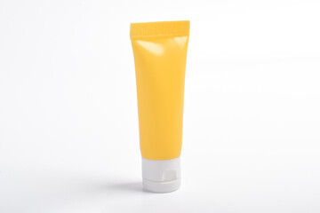 Tube of cream isolated white background, mockup plastic tube for cosmetics