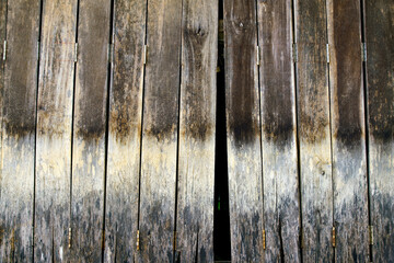 Weathered Wooden Planks with Split for Natural Light Entry