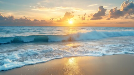 Obraz premium Golden Sunrise Over Ocean Waves A Tranquil Beach with Clouds Above
