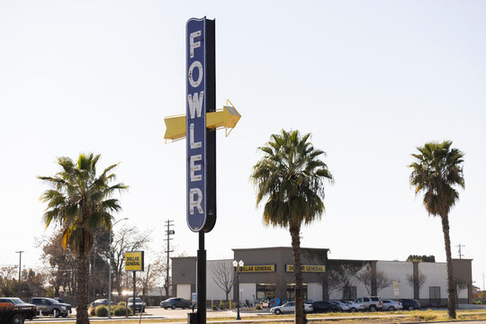 Fowler, California, USA - March 24, 2025: The historic Fowler direction sign points the way to downtown.