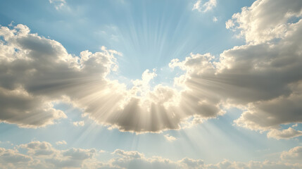 Soft golden haze illuminating upper sky with radiant clouds and sun rays