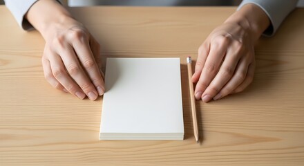 Obraz premium Preparing to write on a blank notepad