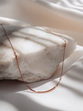 neckless on a marble stone 