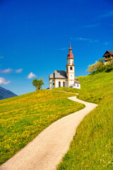 ヨーロッパの美しい田園風景とヨーロッパ風教会合成