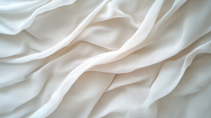 Obraz premium Soft white fabric drapes elegantly, showcasing delicate folds and textures