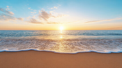 Obraz premium Sunset over ocean waves gently lapping on sandy shore creates tranquil atmosphere