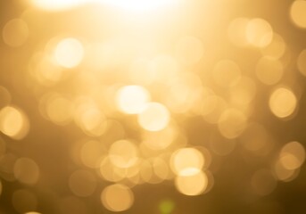 Obraz premium Golden bokeh lights abstract background with soft focus