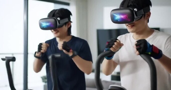 Men wearing VR headsets exercising on elliptical machines in a living room.