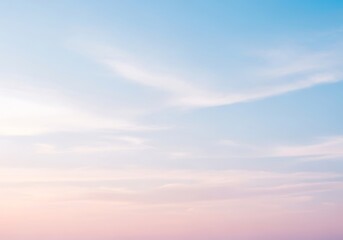 Fototapeta premium Soft pastel sky with wispy clouds at sunrise or sunset
