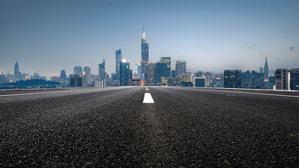 Modern city road with skyscrapers in the background
