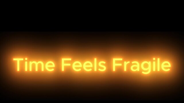 The words time feels fragile are displayed with an orange glow effect