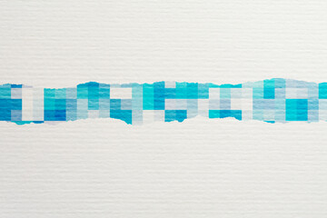 白い紙と青色のモザイク