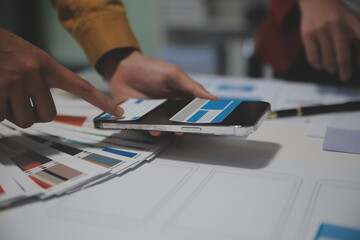 Professional interior designer at workplace in office, closeup