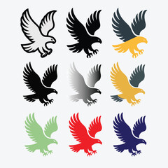 Obraz premium Eagle Icon Set Illustration Featuring Nine Flying Bird Symbols In Multiple Colors Including Black White Yellow Red And Blue Vector Graphic For Wildlife Design Mascot Logo And Freedom Concept