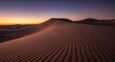 Sand dunes at sunset wavy patterns in the sand arid landscape for travel and nature photography