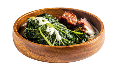Food in wooden bowl leafy greens, meat, and creamy sauce