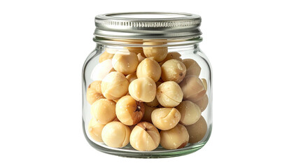 Macadamia nuts packed neatly in a glass jar with a silver lid