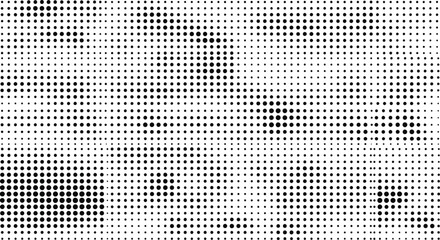 Fototapeta premium Abstract black and white halftone pattern vector background with variable size dots creating gradient texture