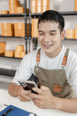 Entrepreneur in ecommerce startup representing innovation, logistics, and retail packaging, showing...