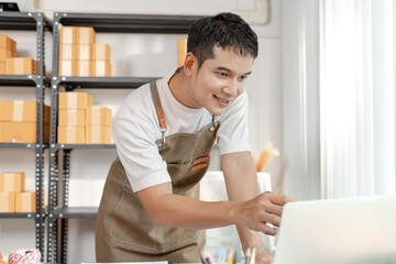 Ecommerce startup business model with entrepreneur preparing goods for delivery, symbolizing...