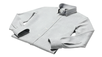 Folded long sleeve button up garment displays a fine checked pattern against a dark backdrop