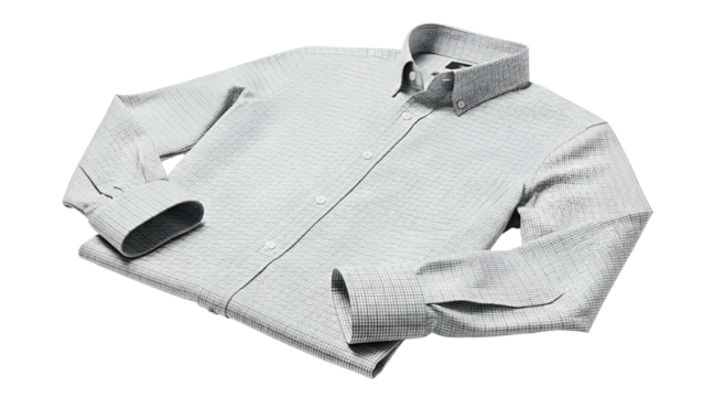 Folded long sleeve button up garment displays a fine checked pattern against a dark backdrop
