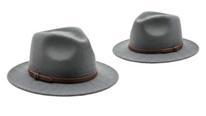 Two felt fedora style hats featuring brown leather bands are displayed against a solid black background