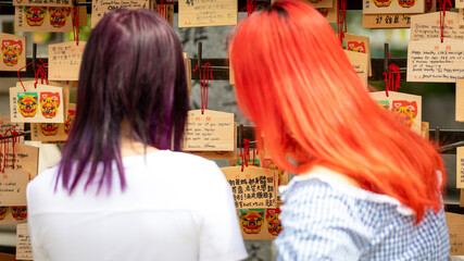 People and Ema votive plaques in Osaka, Japan on September 18th 2025