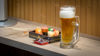 Sushis and beer in Osaka, Japan on September 2025