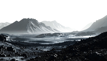 Grey mountain range at sunrise. Silhouetted rocks below